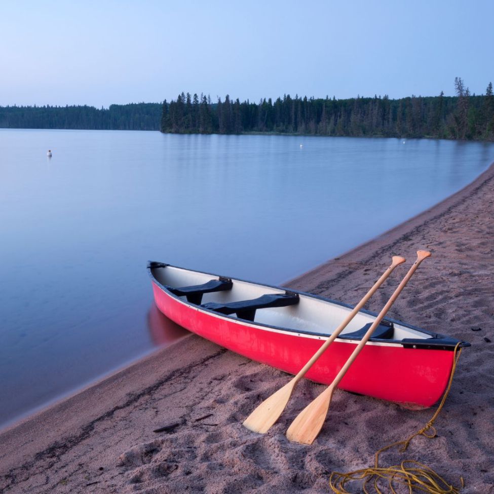 Paddling a canoe out from Bateman Island in Prince Albert, Saskatchewan.